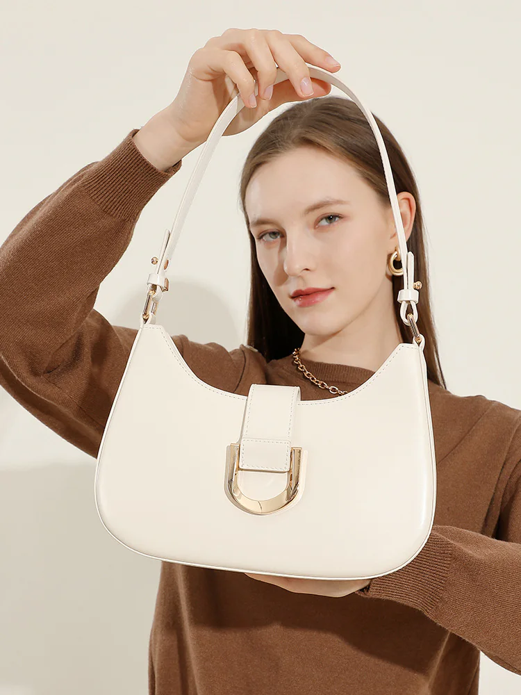 Curved Leather Baguette — BODA leather handbag manufacturing