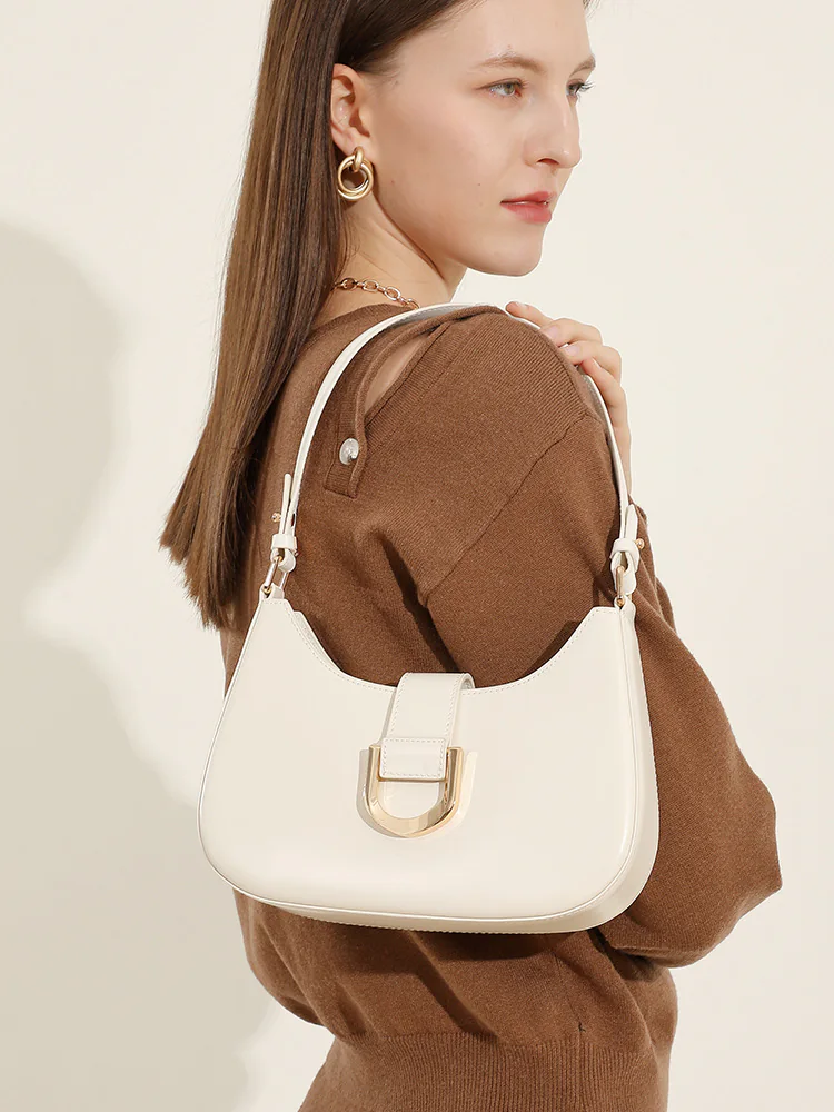 Curved Leather Baguette — BODA leather handbag manufacturing